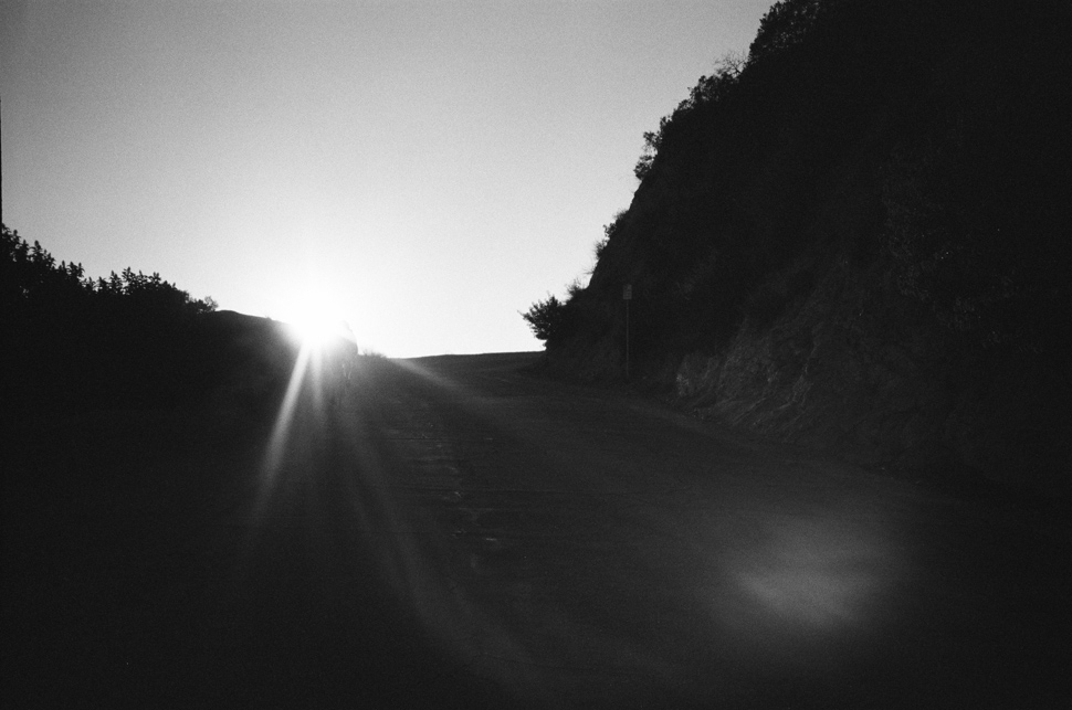 Sun obscured by helmet shot, slightly off.